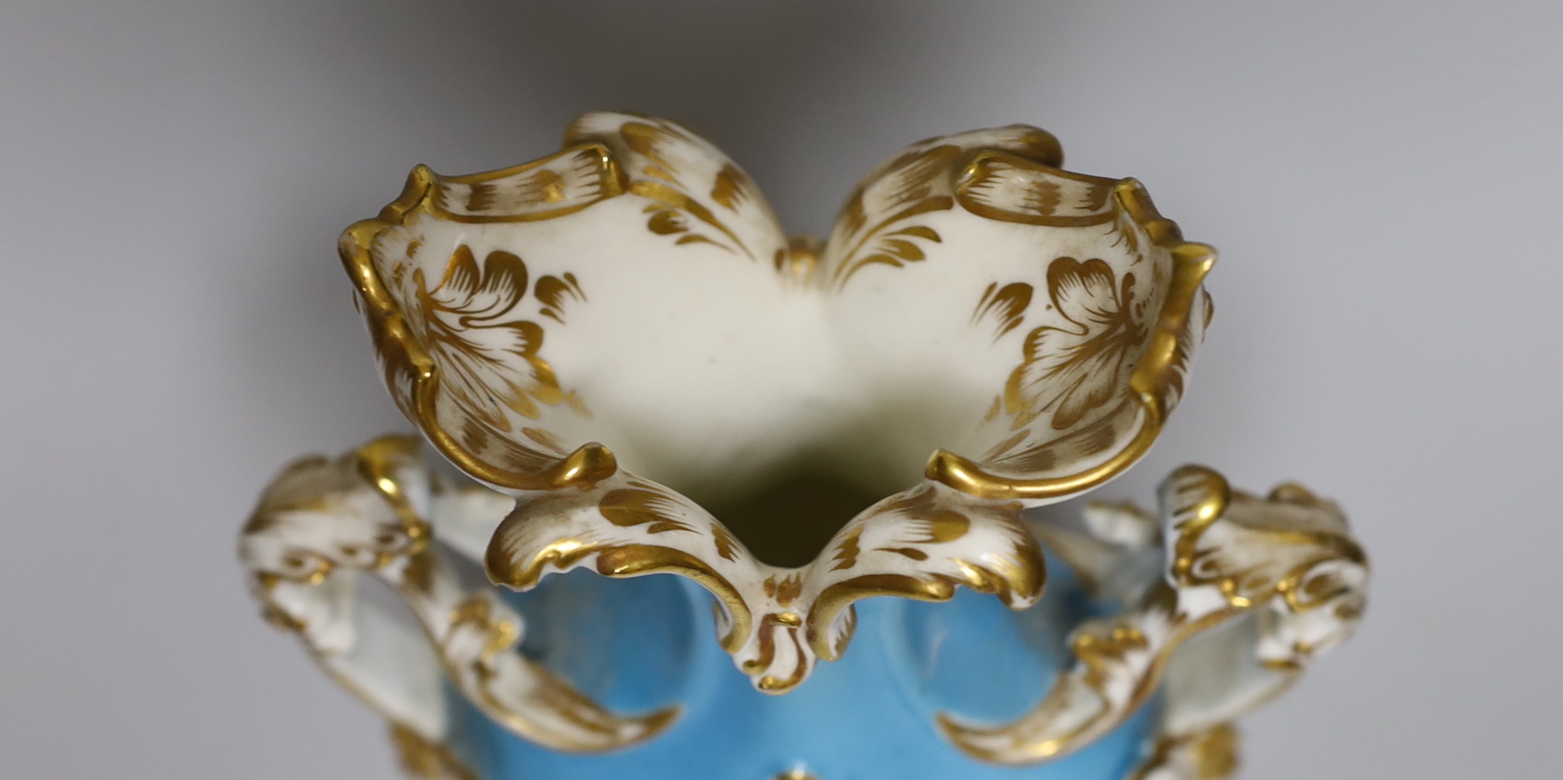 A Coalport rococo two handled vase, painted with birds, probably by John Randall, on a turquoise ground, c.1840, 23cm tall